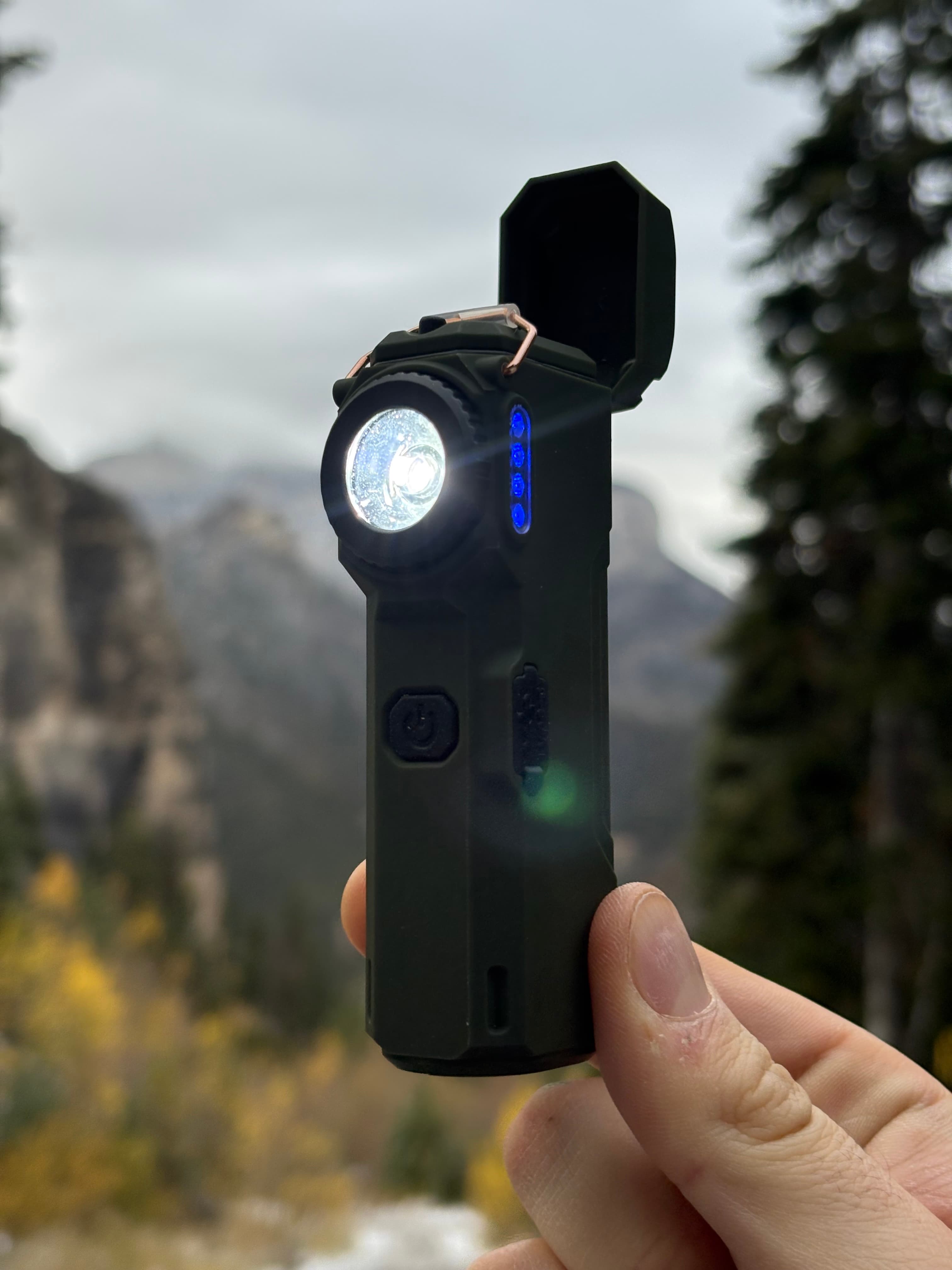The Arc 80 held up against mountains and pines with its flashlight on